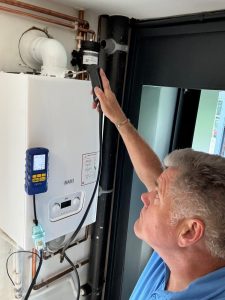 Engineer carrying out tests on a domestic heating system